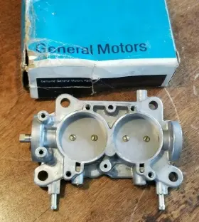 Gm 679033 Nos 2bbl Carburetor Base Plate Part Number