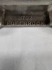 Edelbrock 8702 4 Barrel Aluminum Carburetor 2" Spacer Used. Price: $35.00.