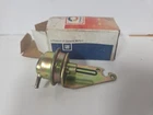 Delco Vacuum Control #7049893 With Bracket Nos New. Price: $12.00.