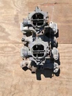 1953-63 Oldsmobile 303 324 Weiand 04D Dual Quad Manifold Carburetors Linkage Used. Price: $750.00.