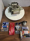 Holley 1850-3 600CFM & Some Quick Fuel Jet, Filters, Pressure Regulator... Used. Price: $190.00.