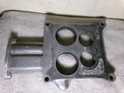 Ford D6VE9A589CC, 4 Bbl Carburetor Spacer Plate With Egr Mount Used. Price: $49.95.