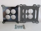 1/2" Ported Phenolic Carburetor Spacer Edelbrock Carter Chevy Ford 4BBL. #9139 New. Price: $23.99.