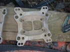 Two Four Barrel Carburetor One Spacer Adapter 27378 Used. Price: $19.99.