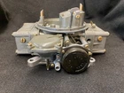 Rebuilt Holley Four Barrel Carburetor 1273 1957 Ford, Merc, T-bird 312 Remanufactured. Price: $999.50.