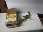 Holley 10R-1943-A= Ford 2BBL 4150G Throt. Oper. Shaft Assy Remanufactured. Price: $14.95.