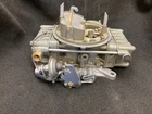 Rebuilt Holley Four Barrel Carburetor 1273 1957 Ford, Merc, T-bird 312 Remanufactured. Price: $799.50.